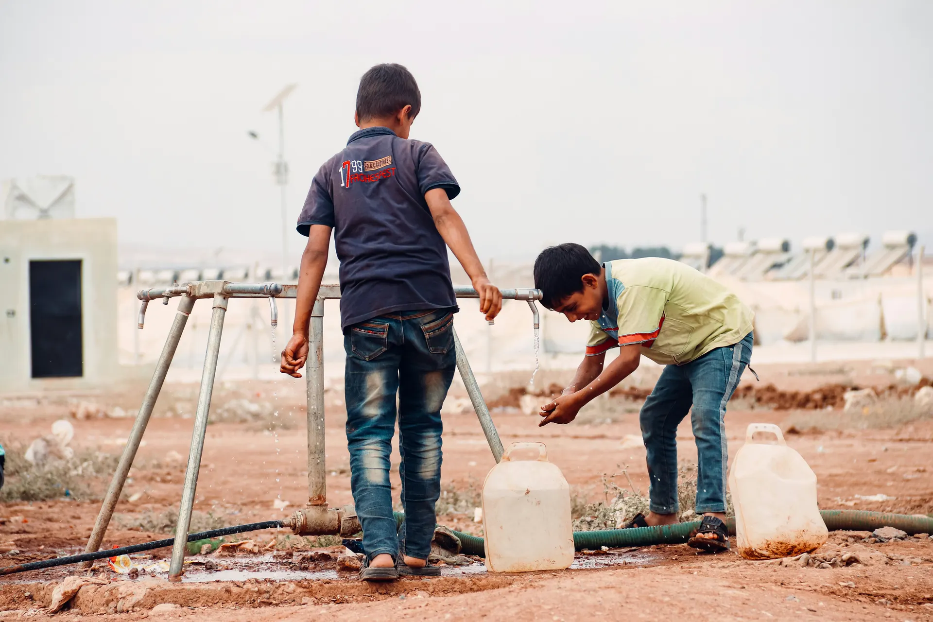 Children enjoying clean water together